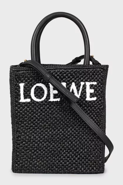 Woven crossbody bag with tag