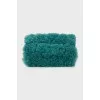 Crossbody bag decorated with fur