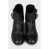 Leather boots decorated with a skull