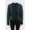 Sweater with buttons on the back