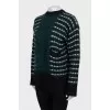 Sweater with buttons on the back