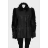 Leather jacket with fur sleeves