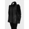 Leather jacket with fur sleeves