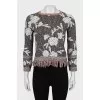 Knitted sweater with fringes