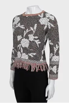 Knitted sweater with fringes