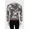 Knitted sweater with fringes