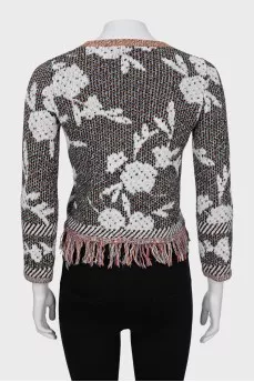 Knitted sweater with fringes