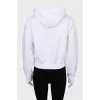 White hoodie with brand logo