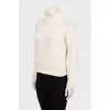 Beige turtleneck sweater