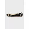 Black patent ballerinas