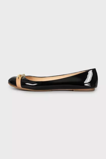 Black patent ballerinas