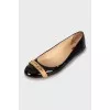 Black patent ballerinas