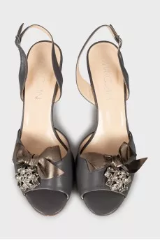 Gray leather sandals with decor