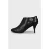 Black leather stiletto ankle boots