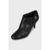 Black leather stiletto ankle boots