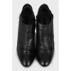 Black leather stiletto ankle boots