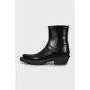 Leather boots with tag
