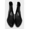 Leather boots with tag