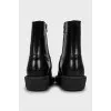 Leather boots with tag