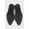 Leather boots with tag