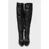 Black leather high heel boots