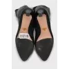 Black leather high heel boots