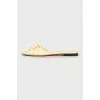Yellow leather slides