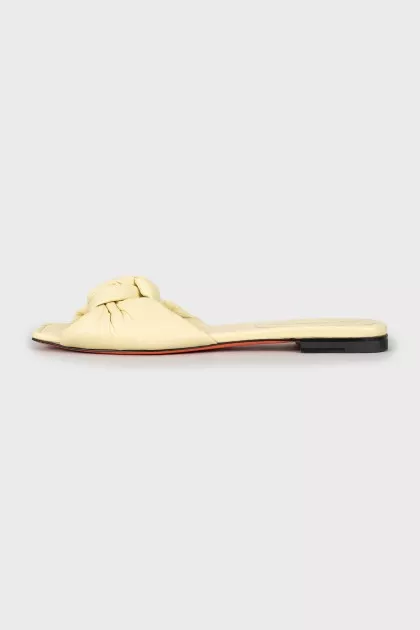 Yellow leather slides