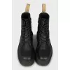 Black leather lace-up boots