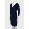 Dress with drapery and tag