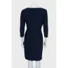 Dress with drapery and tag