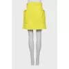 Yellow skirt decorated with a bow