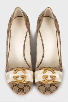 Textile shoes with signature print