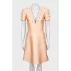 Fitted dress with tag