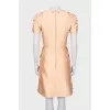 Fitted dress with tag