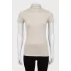 Beige short sleeve golf