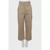 Beige trousers with pockets