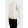 Beige vest with tag