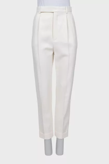 White trousers with tag