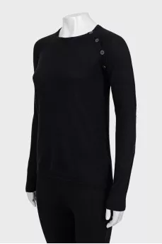 Jumper with leather inserts on the sleeves