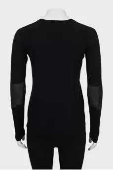 Jumper with leather inserts on the sleeves