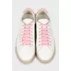 White sneakers with brand logo