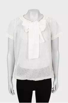 Translucent blouse with a pattern