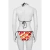 Swimsuit in abstract print with tag