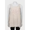 Beige sleeveless blouse