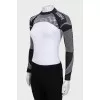 Чорно-білий спортивний топ із биркою