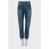 Dark blue jeans with raw hem