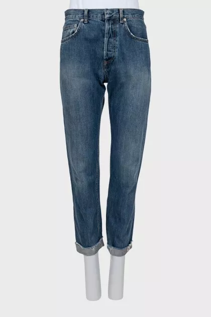 Dark blue jeans with raw hem