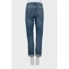 Dark blue jeans with raw hem