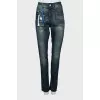 Jeans with patch pockets and tag
